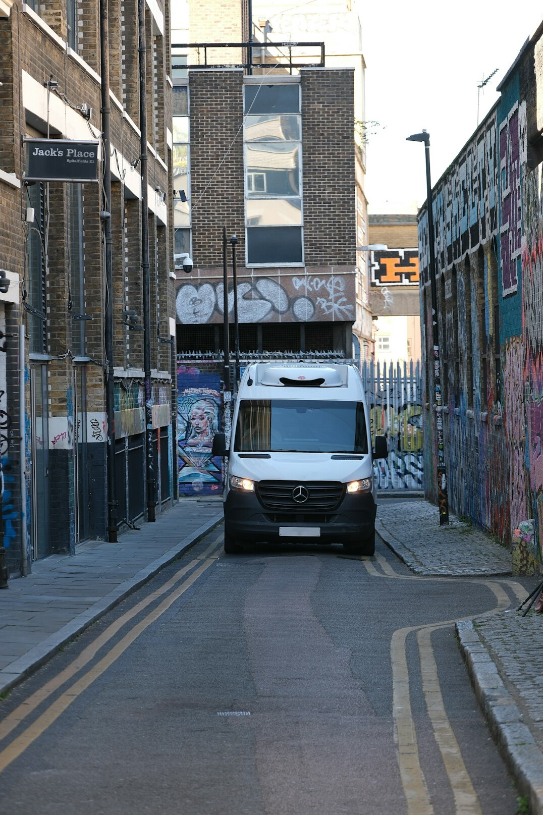 Outside broadcast van parked with cables running to a live event