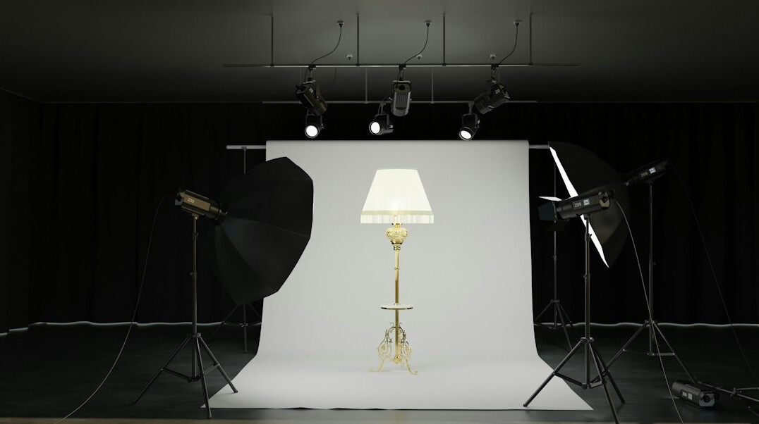 Multiple broadcast cameras positioned around a television studio floor
